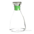 Stemless glass beverage picther with steel lid